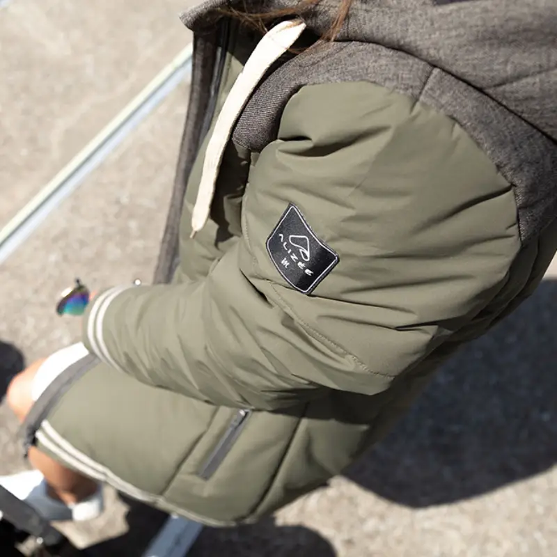 Detail of the ALIZEE logo on the left sleeve of the UNIVERSITY winter jacket olive-taupe-44694