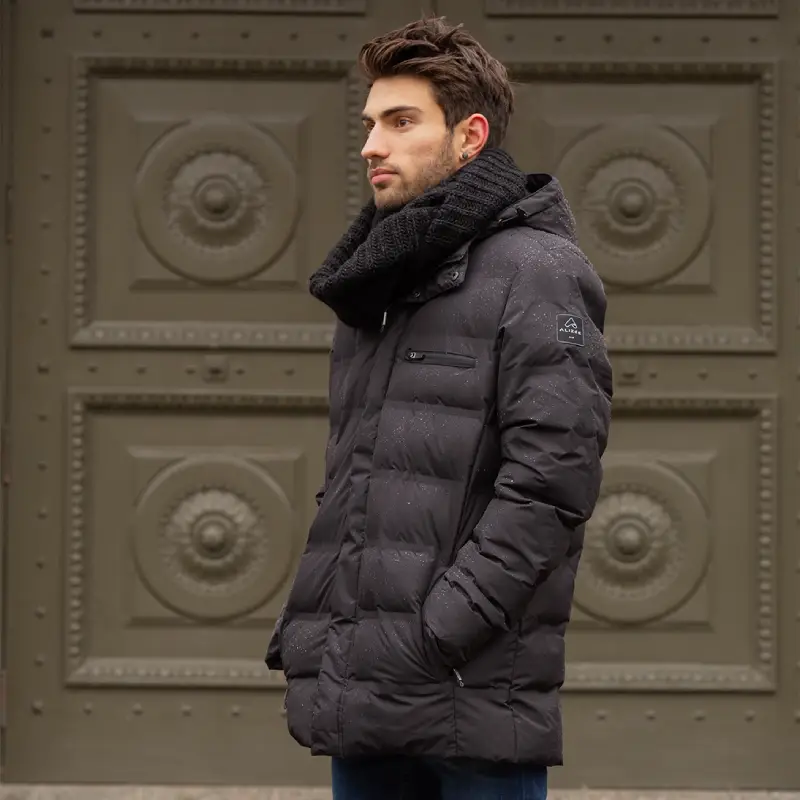 Our model wears the men's winter jacket OFFICE black-43675