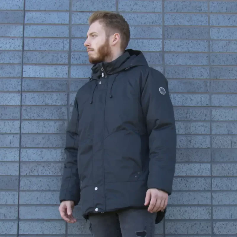 Model wearing the men's winter jacket ZONE black front view - 43720