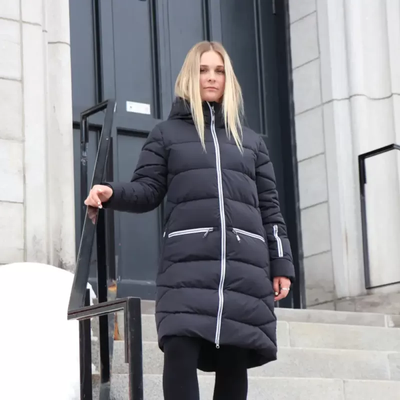 Our model wears the NEST black-white winter jacket