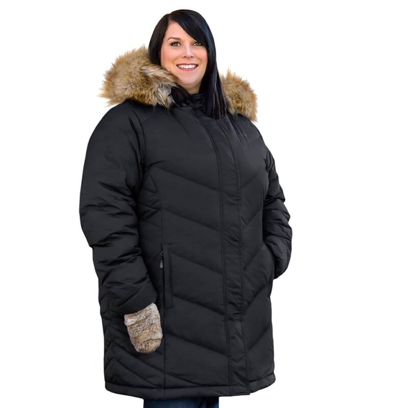 a woman wearing the coat CIRRRUS 44660O noir