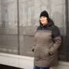 Our model wears the winter jacket plus size COLLEGIATE black-taupe-44710O