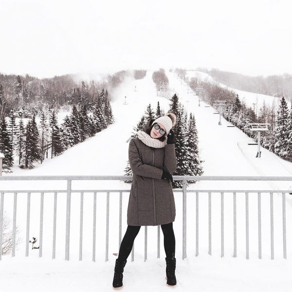 Model wearing the YORKDALE - 44712 women's coat by Alizée at Le Relais ski resort