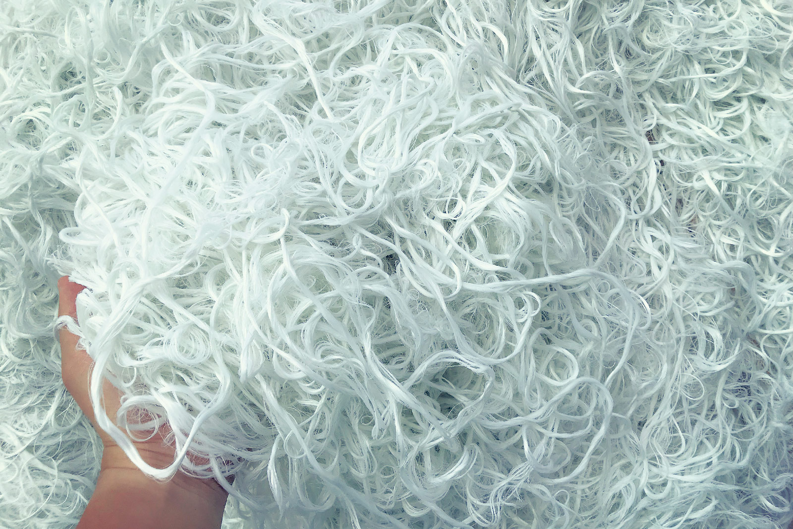 Photo de fibres de polyester d'isolants recyclé utilisées pour les manteaux