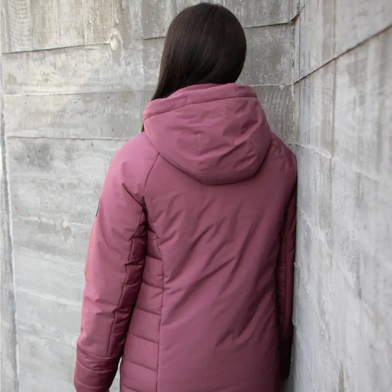 Our model wears the winter jacket SIDEKICK wineberry, back view-44747
