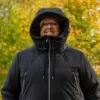 Our model wears the winter jacket COSMO black, front view